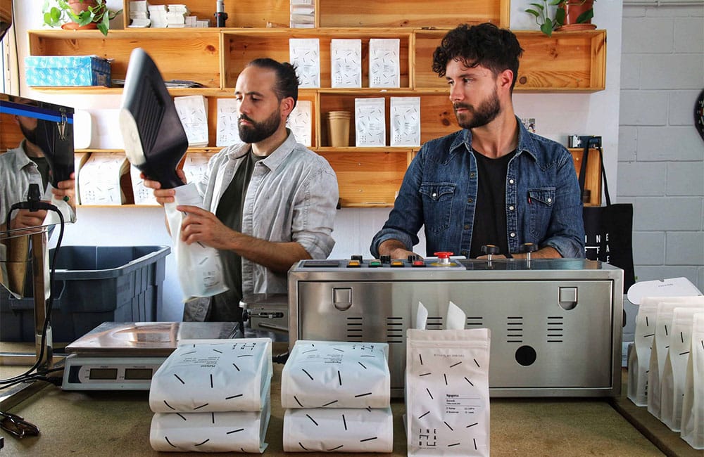 Packing coffee beans in Ineffable Coffee